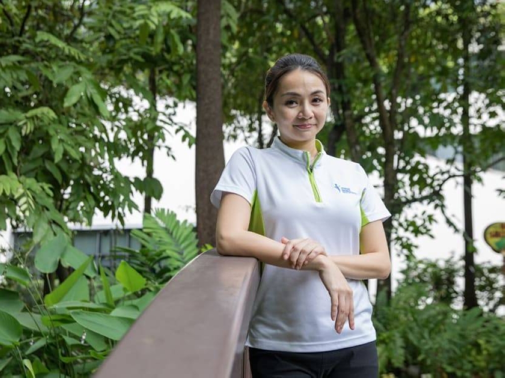 Ms Sandra Goh flew with SIA for 15 years before taking on the role of the manager of inpatient services at KTPH. — TODAY pic
