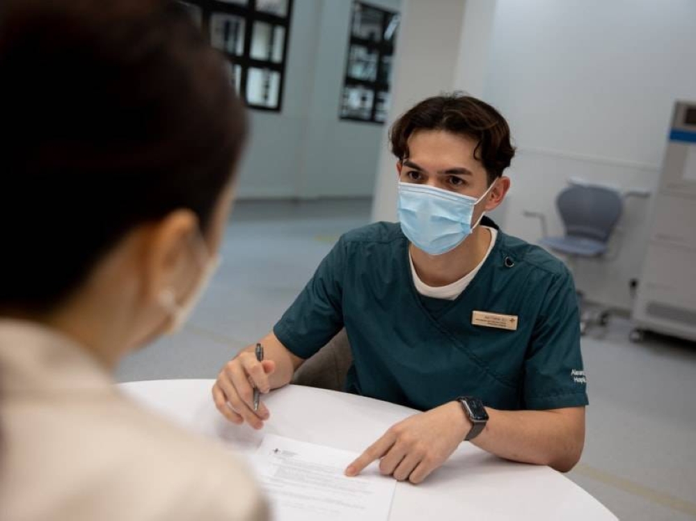 Former SIA flight attendant Matthew Eli Aeria Bellido, who served with SIA for four years before being deployed to Alexandra Hospital as a care ambassador, said his six-month stint in the hospital’s specialised rehabilitation ward left an imprint on him. — TODAY pic