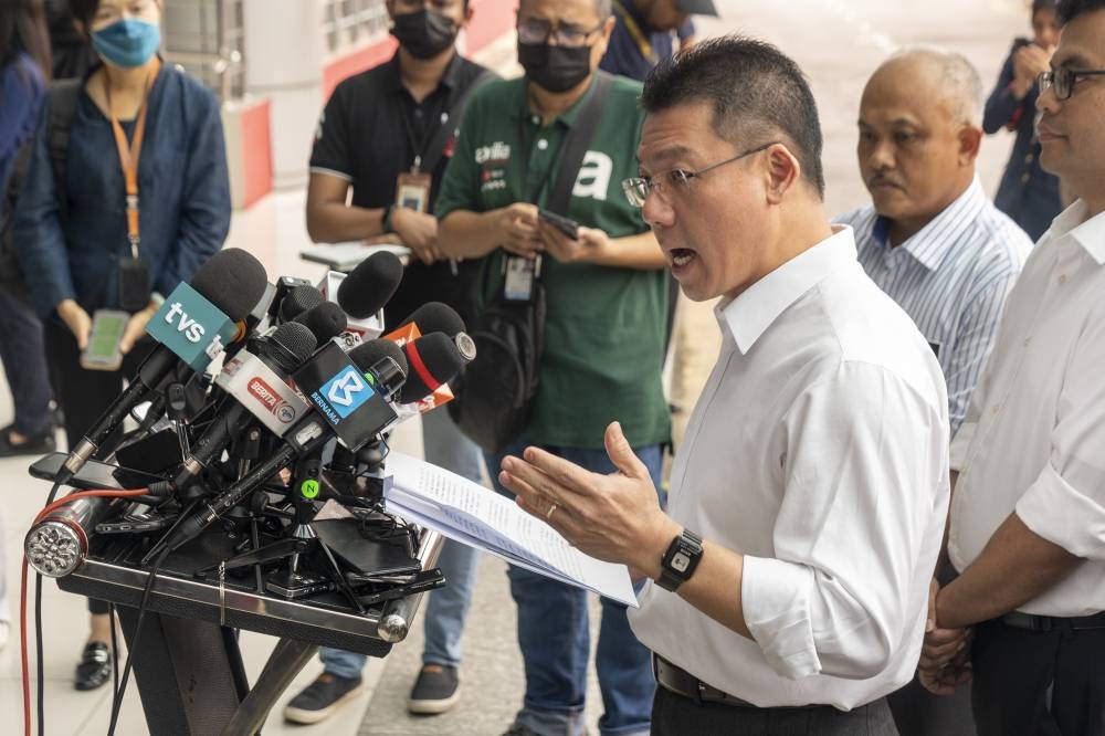 Minister of Local Government Development, Nga Kor Ming speaks to the media on the preparedness of the Fire and Rescue Department for the Northeast Monsoon at Fire and Rescue Department Headquarters in Putrajaya, December 14, 2022. — Picture by Shafwan Zaidon