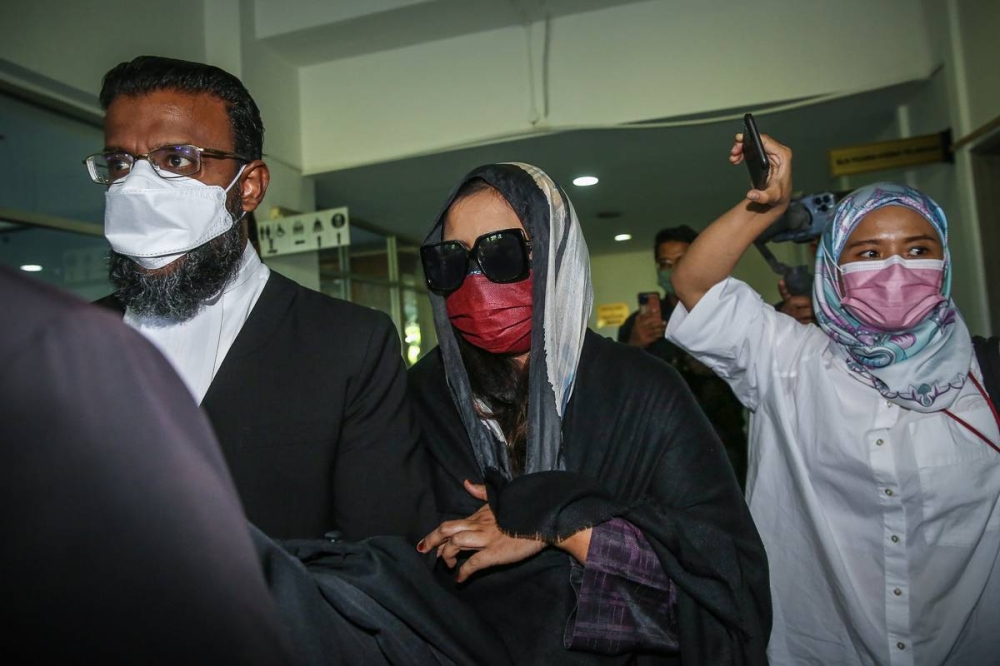 Samirah Muzaffar, accused of murdering her husband Cradle Fund chief executive Nazrin Hassan, arrives at the Shah Alam High Court June 21, 2022. — Picture by Yusof Mat Isa
