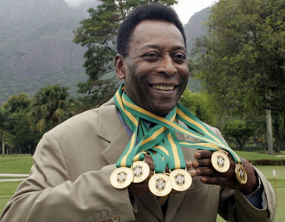 In this file photo taken on December 22, 2010 Brazilian football legend Edson Arantes do Nascimento, known as 'Pele', poses with his six Brazil's champion medals during a ceremony in Rio de Janeiro, Brazil. — AFP pic