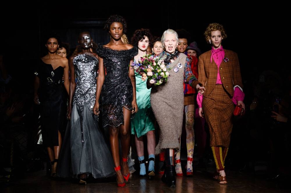 In this file photo taken on February 21, 2016 British designer Vivienne Westwood stands with models during the finale of her catwalk show at the Autumn / Winter 2016 London Fashion Week in London. — AFP pic