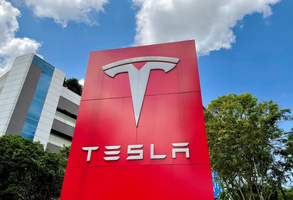 Tesla has set a long-term goal of increasing its deliveries by 50 per cent a year on average. ― Reuters pic