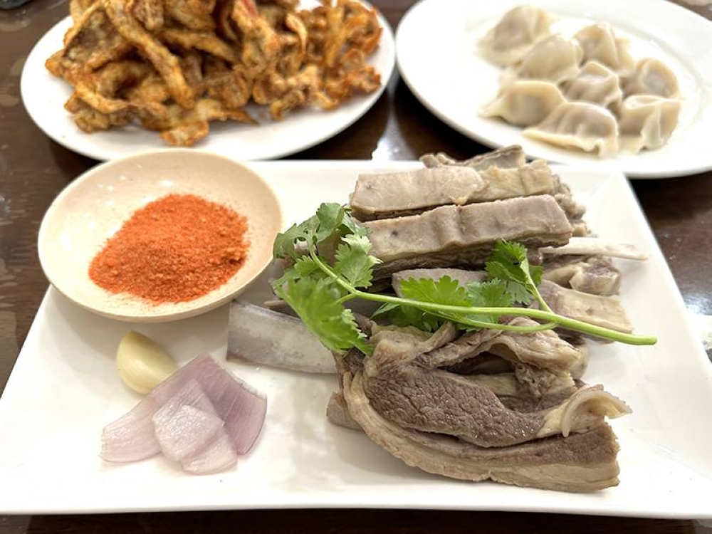 Juicy Poached Lamb is served with a mildly spicy cumin and chilli dip at Lamb Shepherd Restaurant – Pictures by Lee Khang Yi