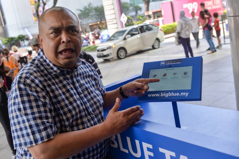 Big Blue Taxi Services founder pleads guilty to charges of cheating, misusing 'Datuk' title - Vimarsana News