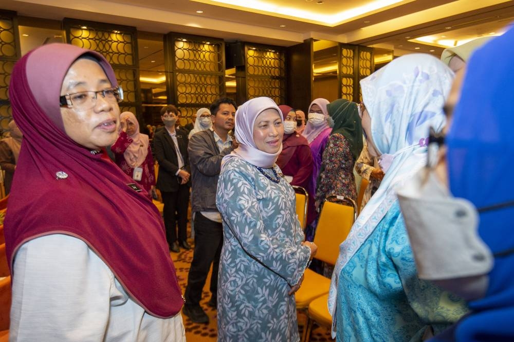 Datuk Seri Nancy Shukri greets government officers at the Women, Family and Community Development Ministry in Putrajaya January 4, 2023. —  Picture by Shafwan Zaidon