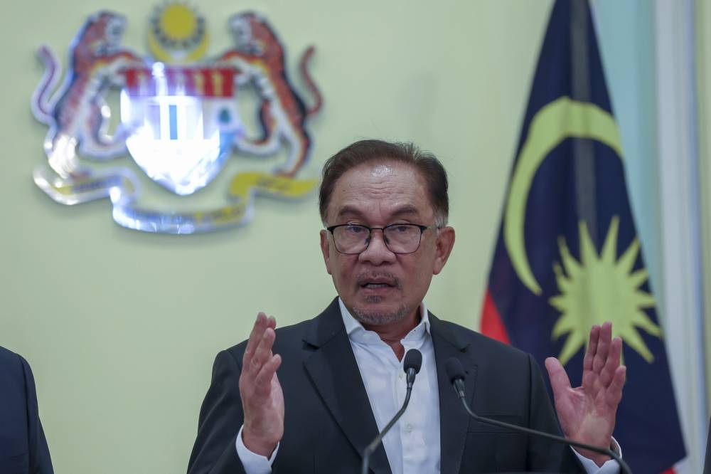 Prime Minister Datuk Seri Anwar Ibrahim said the company will build an EV manufacturing facility specifically for the transportation sector. — Bernama pic