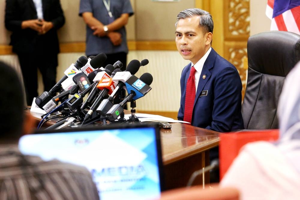 Communications and Multimedia Minister, Fahmi Fadzil said he would Cyber Security Malaysia and Personal Data Protection Department to investigate whether there was a data leak involving the parties concerned. ― Picture by Choo Choy May