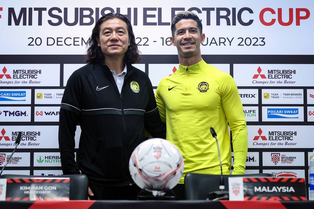 National head coach Kim Pan Gon (left) and national footballer Brendan Seng Ling Gan are seen during the 2022 Asean Football Federation (AFF) Cup pre-match press conference in Kuala Lumpur January 6, 2023. — Bernama pic