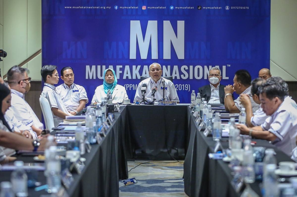 Muafakat Nasional president Tan Sri Annuar Musa (centre) speaks during a news conference at the Dorsett Hotel in Kuala Lumpur January 7, 2023. — Picture by Yusof Mat Isa