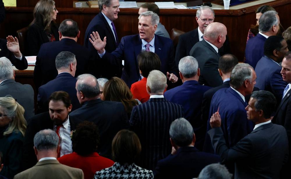 US House Republican Leader Kevin McCarthy calls for members of Congress to change their votes to not adjourn the House and hold another vote for Speaker of the House shortly after things became physical between Republican representatives on the floor of the House in a late night session of voting on the fourth day of the 118th Congress at the US Capitol in Washington, US, January 6, 2023. — Reuters pic