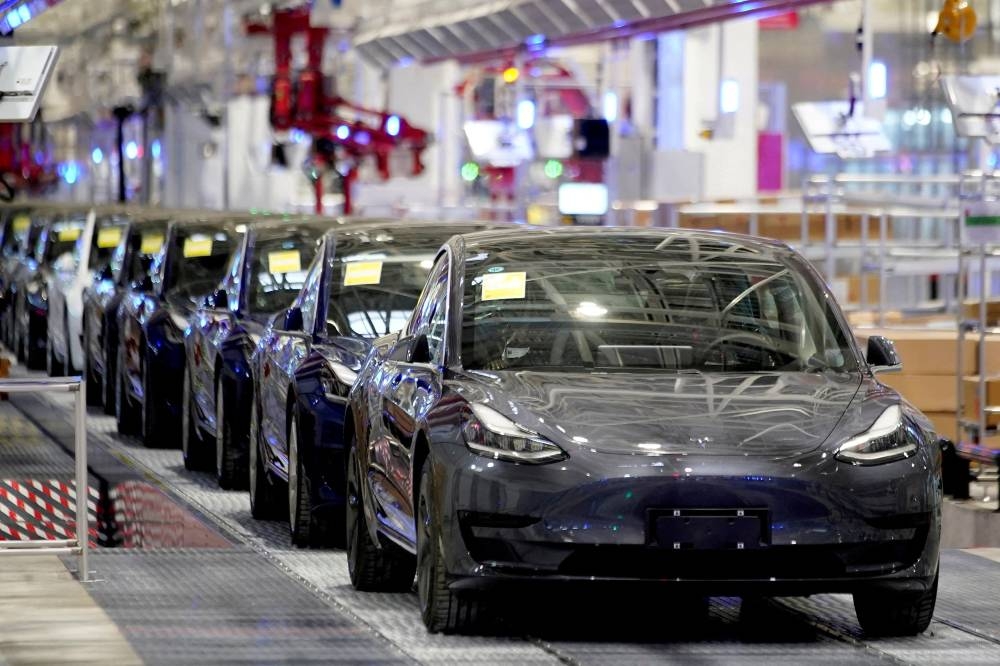 File photo of Tesla China-made Model 3 vehicles seen during a delivery event at its factory in Shanghai, China January 7, 2020. — Reuters pic