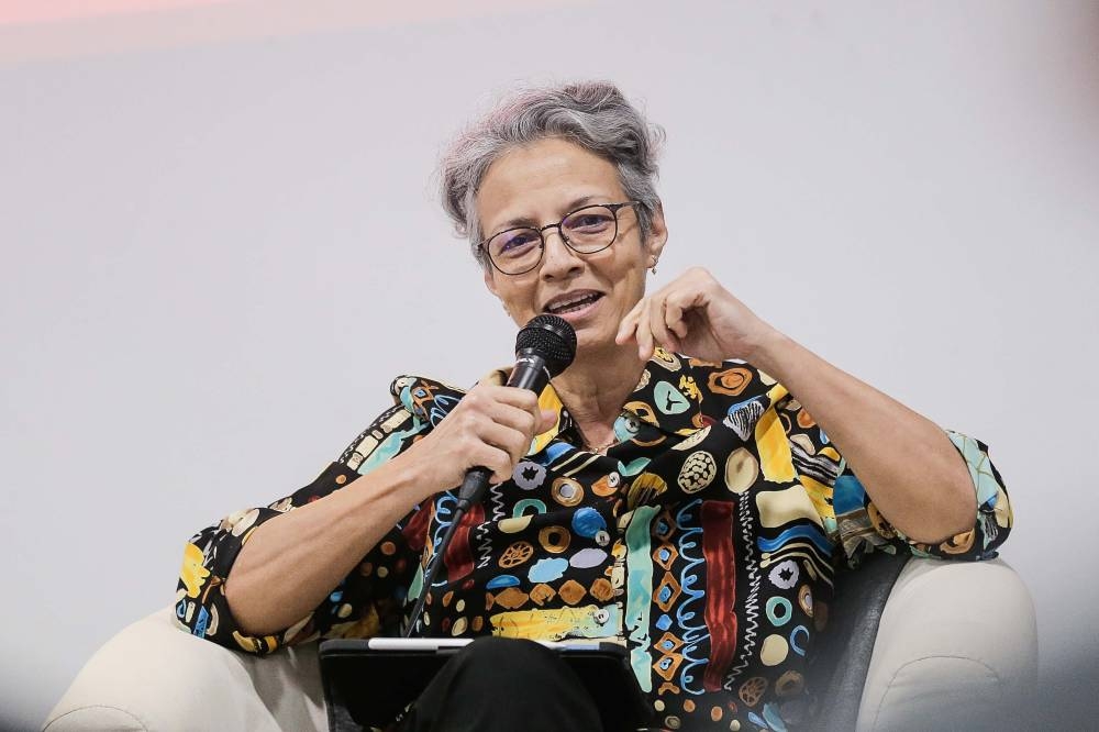 Lecturer at the Faculty of Social Science and Humanities, Universiti Kebangsaan Malaysia Sharifah Munirah Alatas delivering her talk as a panelist during the 'Life After: Oral Histories of the May 13 Incident' book launching.