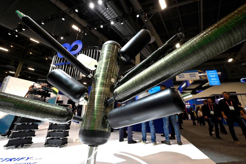 High pressure hydrogen vessels are displayed at the Plastic Omnium booth during CES 2023 at the Las Vegas Convention Centre on January 05, 2023 in Las Vegas, Nevada. — David Becker/Getty Images pic via AFP 