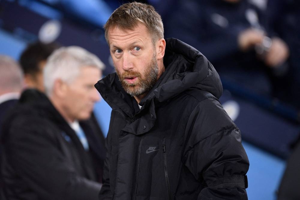 Chelsea's English head coach Graham Potter arrives for the English FA Cup third round football match between Manchester City and Chelsea at the Etihad Stadium in Manchester, north-west England, on January 8, 2023. — AFP pic