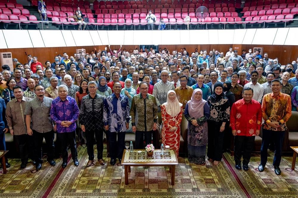 Prime Minister Datuk Seri Anwar Ibrahim (front row, centre) attends a dinner session hosted by the Malaysian Embassy in Jakarta January 8, 2022. — Picture via Facebook/Anwar Ibrahim
