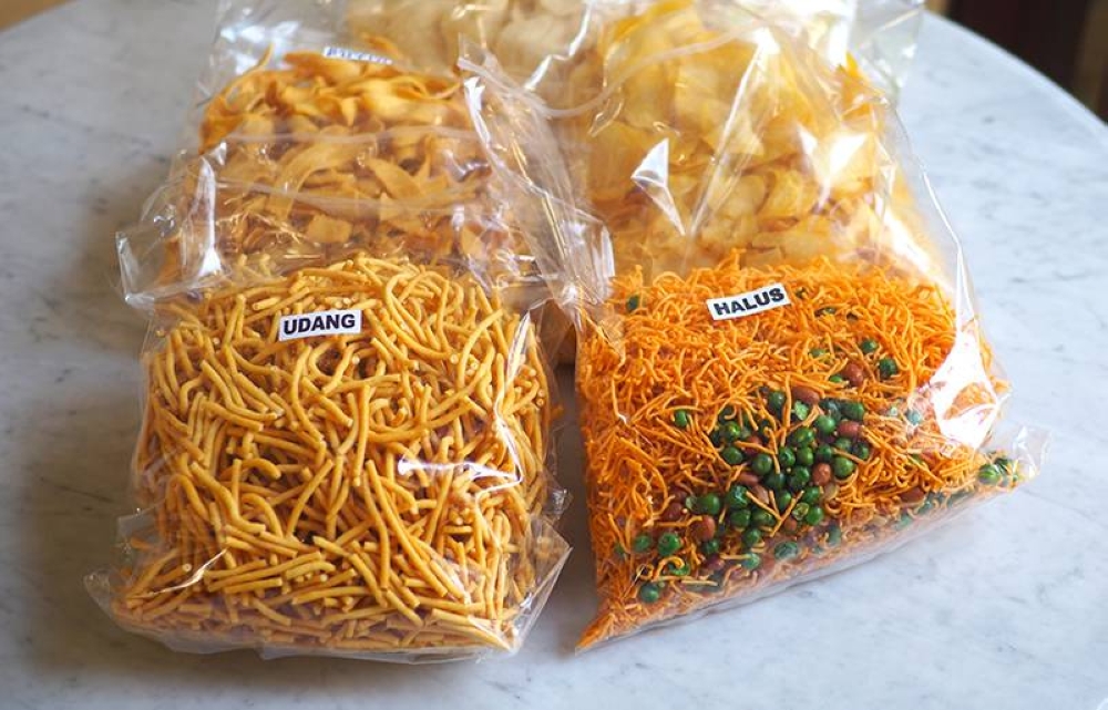 Each packet of 'murukku' is sold for RM11 by this old uncle based in Chow Kit.