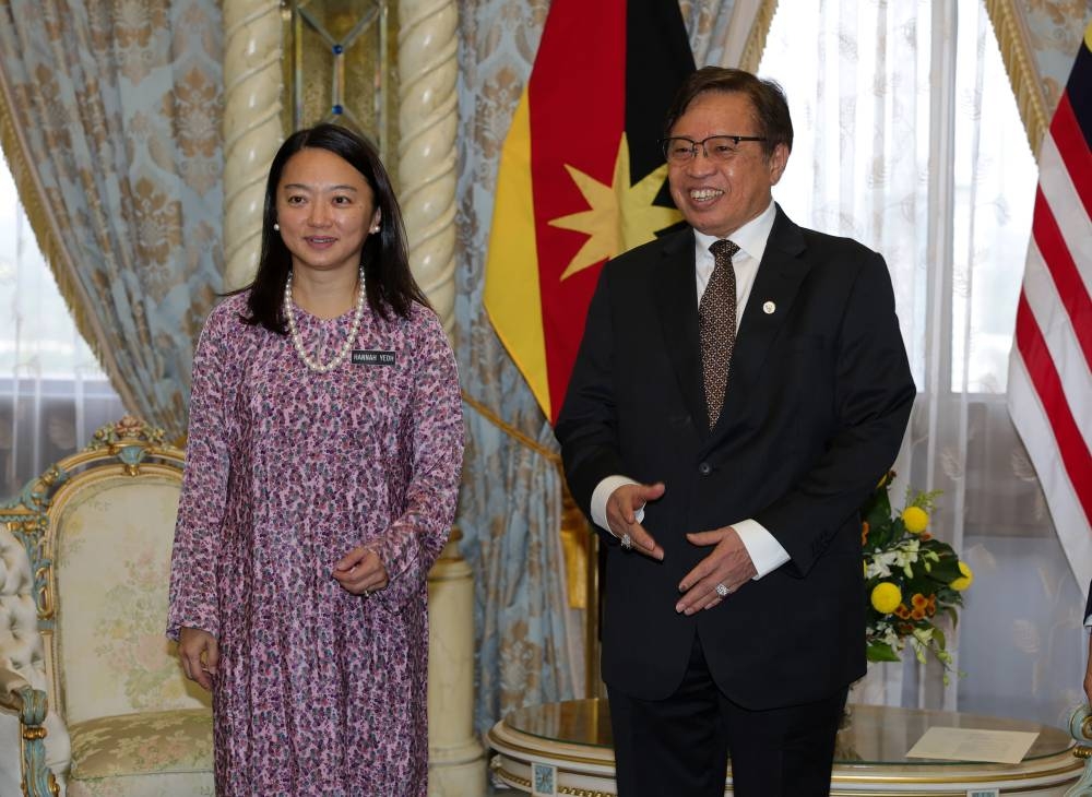 Youth and Sports Minister Hannah Yeoh and Sarawak Premier Tan Sri Abang Johari Openg ahead of a meeting at Wisma Bapa Malaysia in Kuching January 9, 2023. — Bernama pic