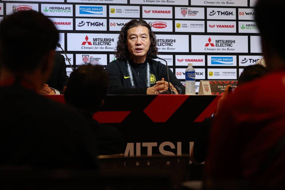 Harimau Malaya head coach Kim Pan Gon speaks during a press conference at Stadium Thammasat in Pathum Thani January 9, 2023. — Bernama pic 