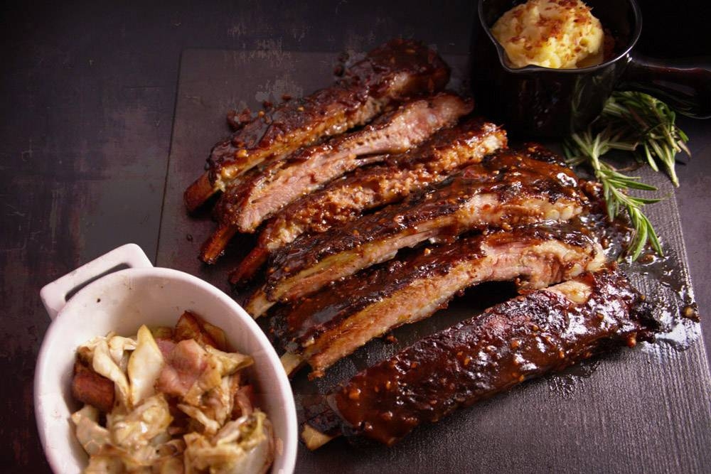 Gluttony’s rack of ribs, with a choice of domestic or imported Spanish Iberico pork.