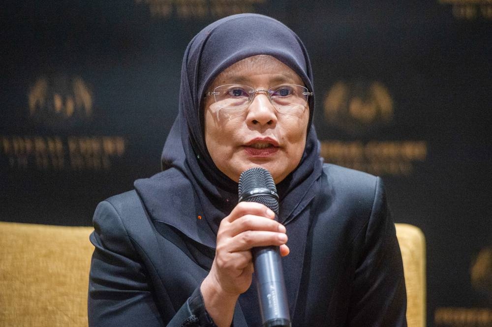 Chief Judge Tun Tengku Maimun Tuan Mat speaks to the media during a press conference after the Opening of the Legal Year at Putrajaya International Convention Centre in Putrajaya on January 9, 2023. — Picture by Shafwan Zaidon