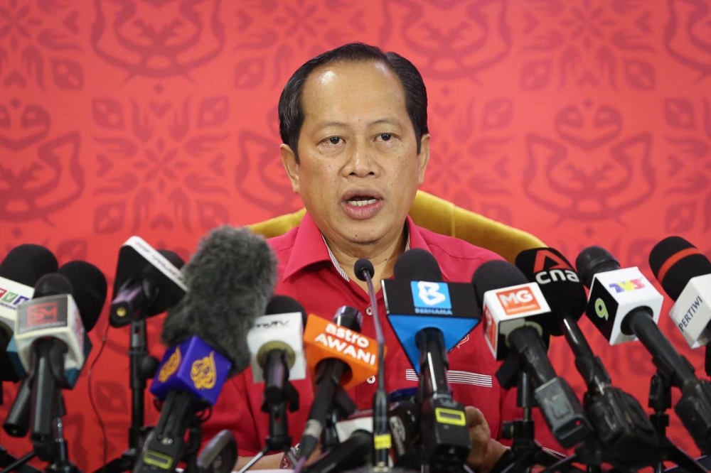 Umno Secretary General Datuk Seri Ahmad Maslan (centre) during a press conference at the party headquarters  at World Trade Centre in Kuala Lumpur January 11, 2023. — Picture by Yusof Mat Isa