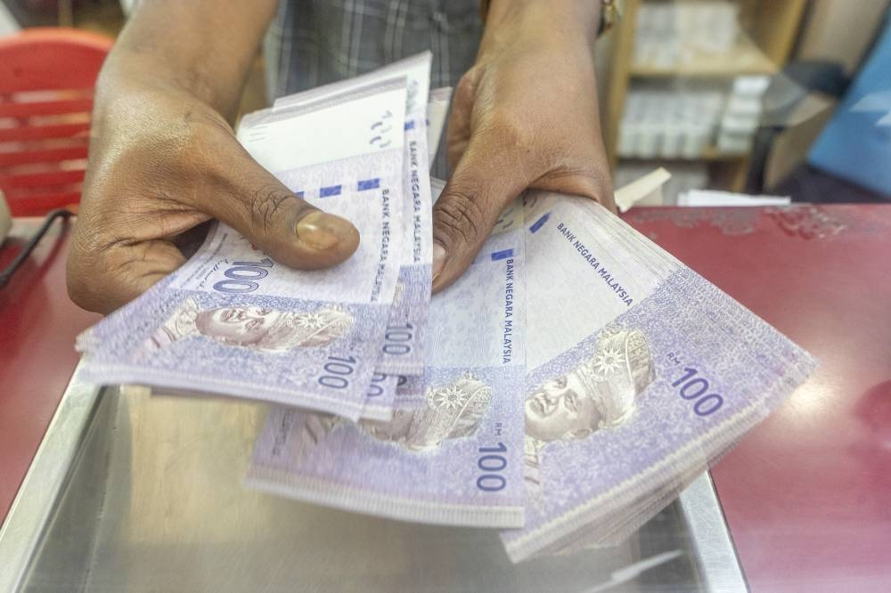 At 9am, the local note rose to 4.3630/3680 against the greenback from yesterday’s close of 4.3700/3725. ― Picture by Shafwan Zaidon