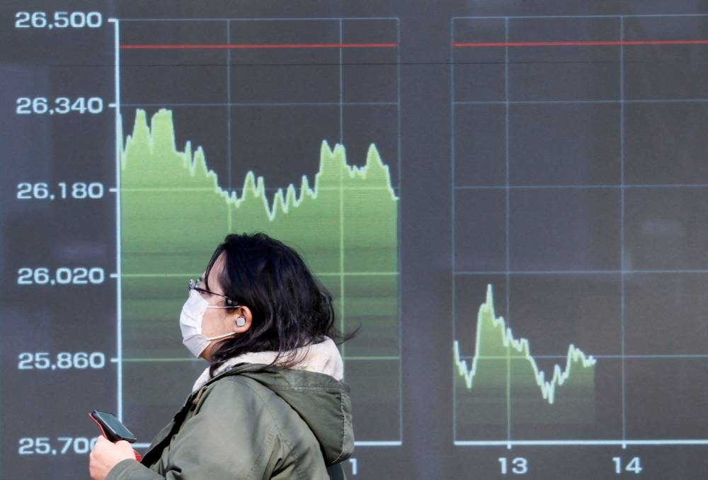 Asian, European markets mostly up ahead of US inflation data | Malay Mail