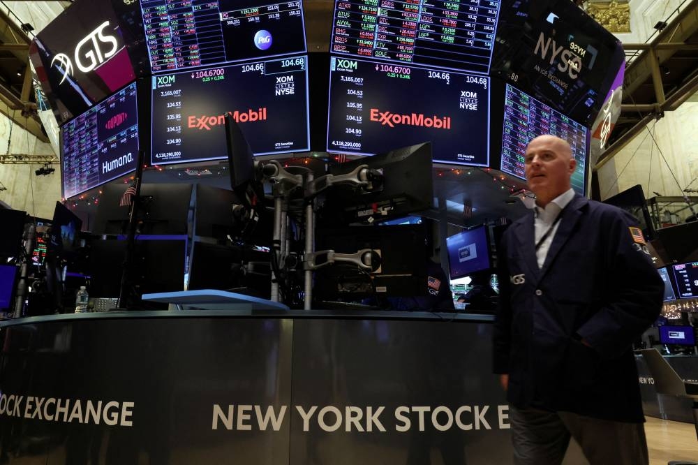 Global stocks rise, dollar stumbles after US inflation data | Malay Mail