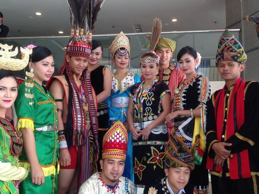 A photo showing natives in Sabah in their traditional costumes. ― Picture by Julia Chan