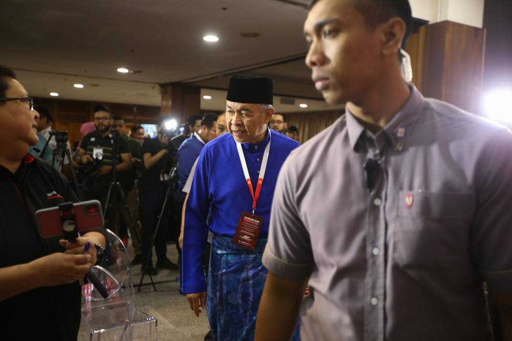 Umno President Datuk Seri Ahmad Zahid Hamidi 2022 is pictured visiting the media centre at the Umno General Assembly in the World Trade Centre Kuala Lumpur, January 14, 2023. — Picture by Ahmad Zamzahuri