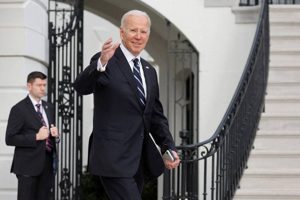 US President Joe Biden departs the White House to board the Marine One helicopter for travel to Delaware from the White House in Washington January 13, 2023. — Reuters pic