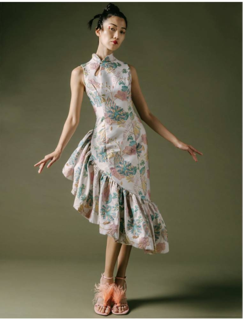 Elegant brocade qipao with asymmetrical ruffles from Maarimaia. — Picture courtesy of Maarimaia