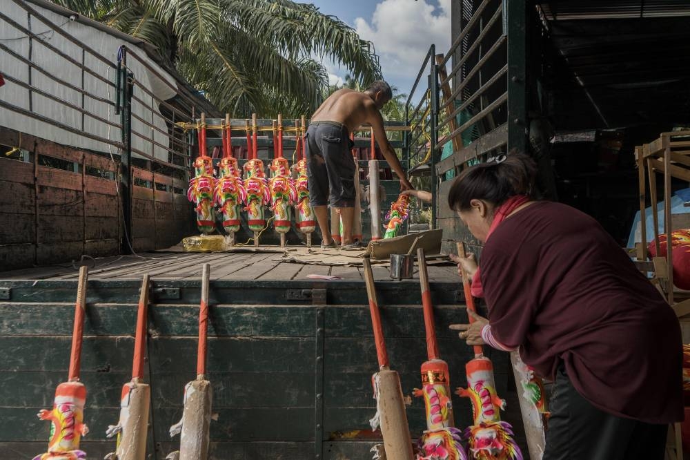 Joss sticks ready to be sent out to customers. — Picture by Shafwan Zaidon