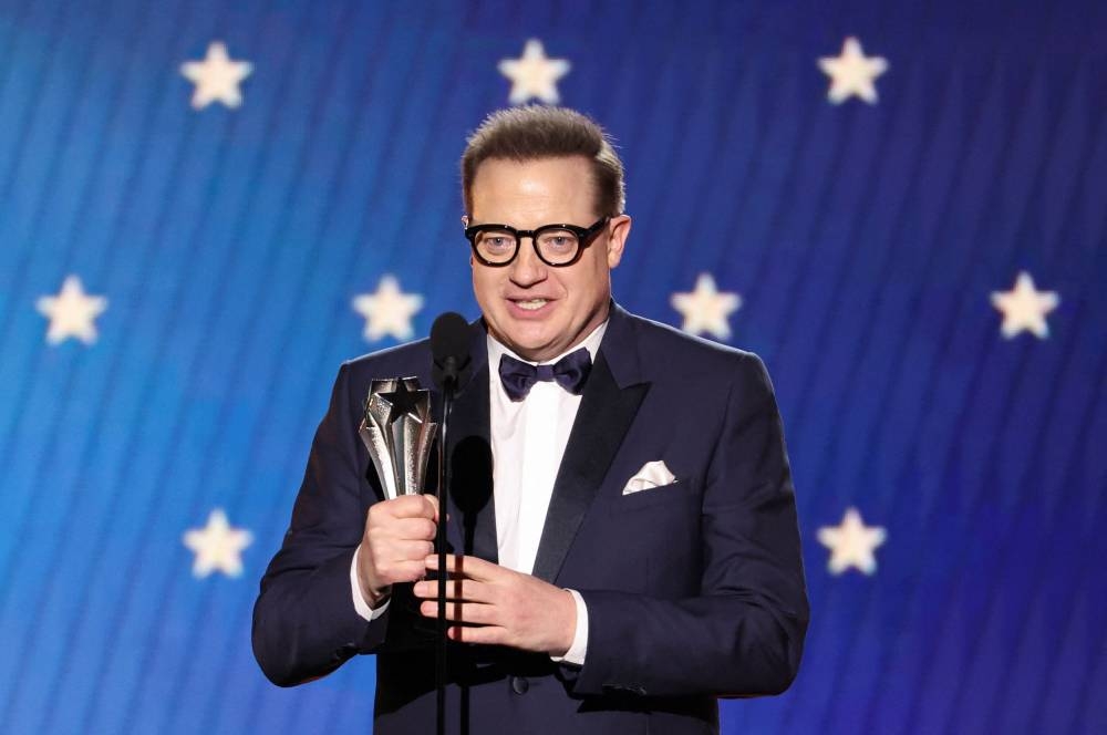 Brendan Fraser accepts the Best Actor award for 
