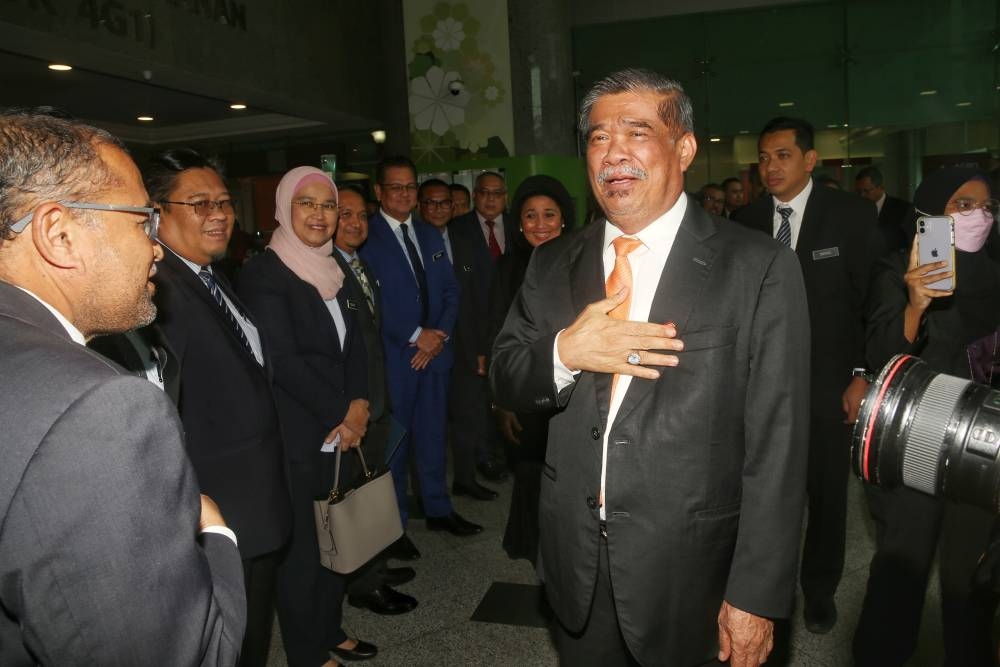 Minister of Agriculture and Food Security Mohamad Sabu meeting some of his staff on his first day at Wisma Tani, Putrajaya December 5, 2022. — Picture by Choo Choy May