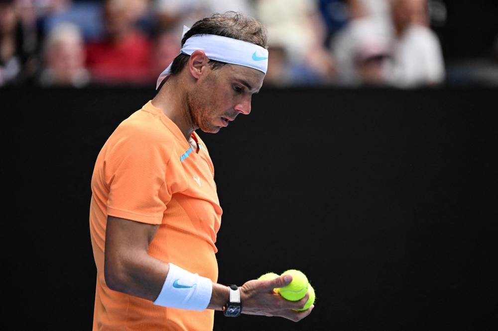 Tennis ball boy takes Rafael Nadal's racket in odd Australian Open
