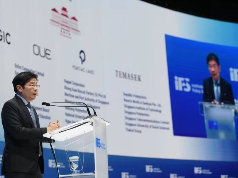 Deputy Prime Minister Lawrence Wong delivering his speech at the IPS Singapore Perspectives Conference on Jan 16, 2023. — Institute of Policy Studies pic via TODAY