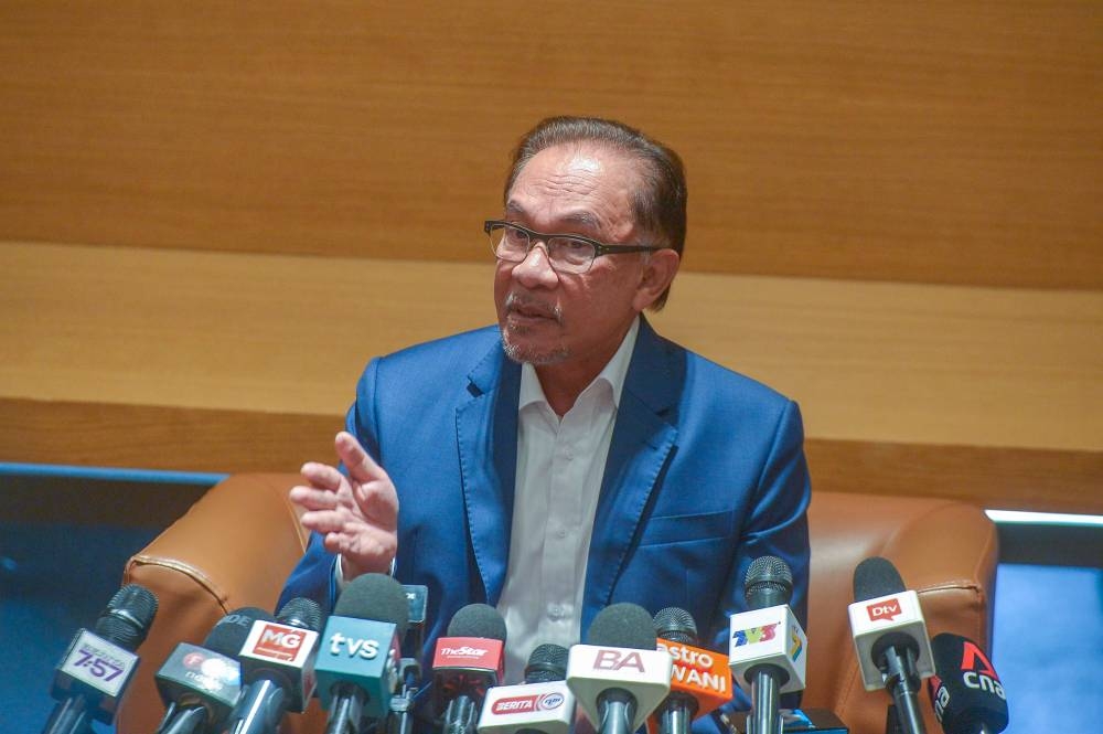 Prime Minister Datuk Seri Anwar Ibrahim speaks to reporters during the Budget 2023 Dialogue in Putrajaya January 17, 2023. ― Picture by Shafwan Zaidon