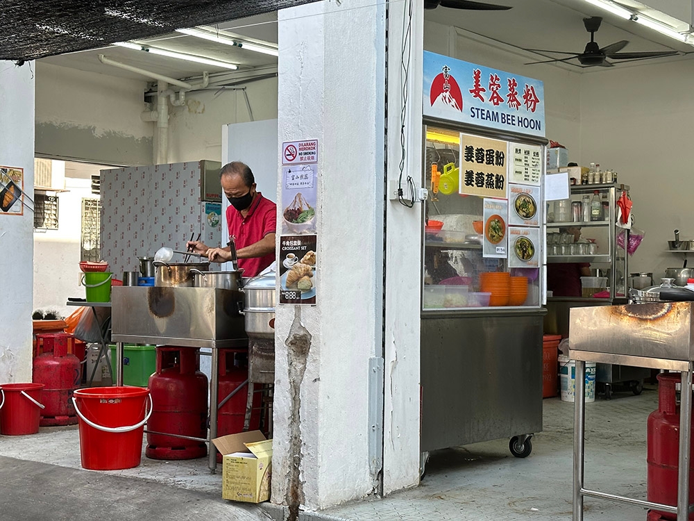 Find the steamed 'bee hoon' at this stall located at the back of the coffee shop.