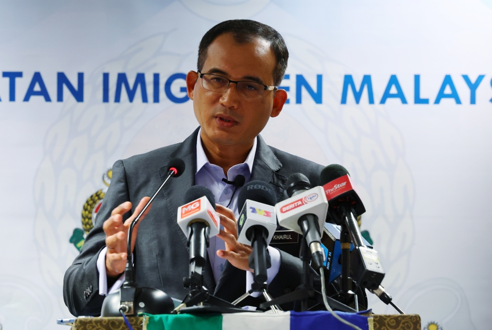 Immigration director-general Datuk Seri Khairul Dzaimee Daud speaks during a press conference at Putrajaya January 18, 2023. — Bernama pic