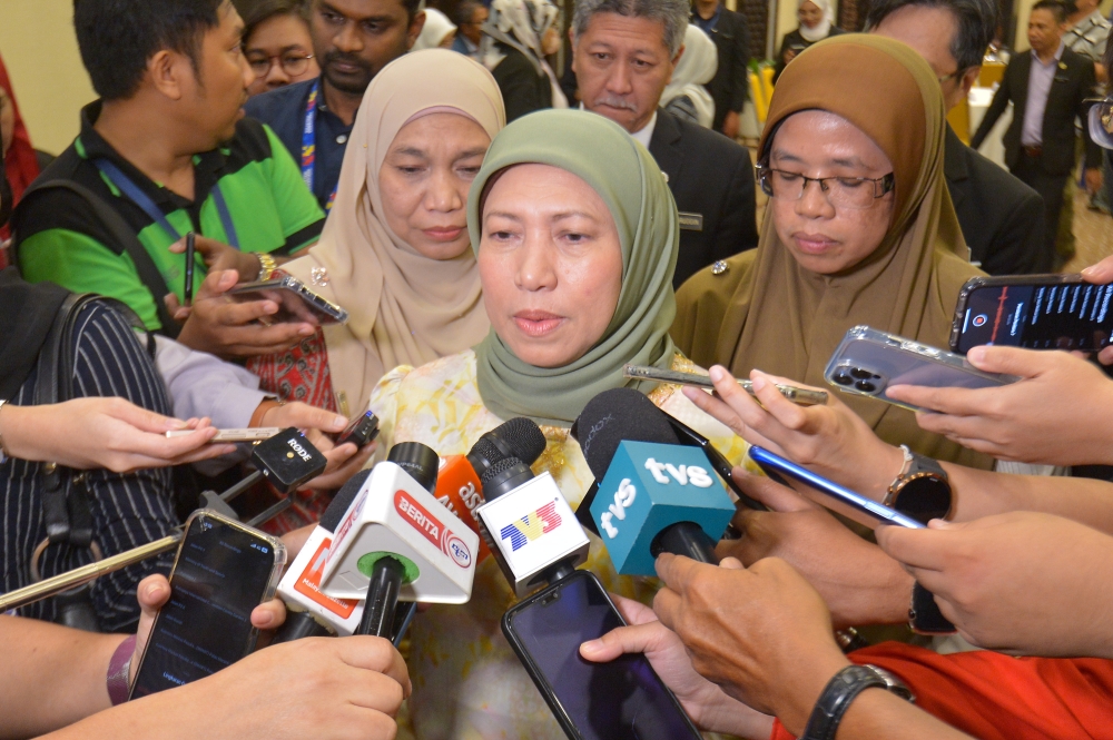 Minister of Women, Family and Community Development  Datuk Seri Nancy Shukri speaks to reporters after a townhall session in Putrajaya January 18, 2023. — Picture by Shafwan Zaidon