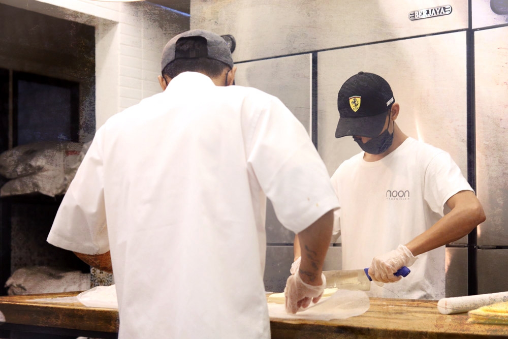 Bakers working hard at their craft.