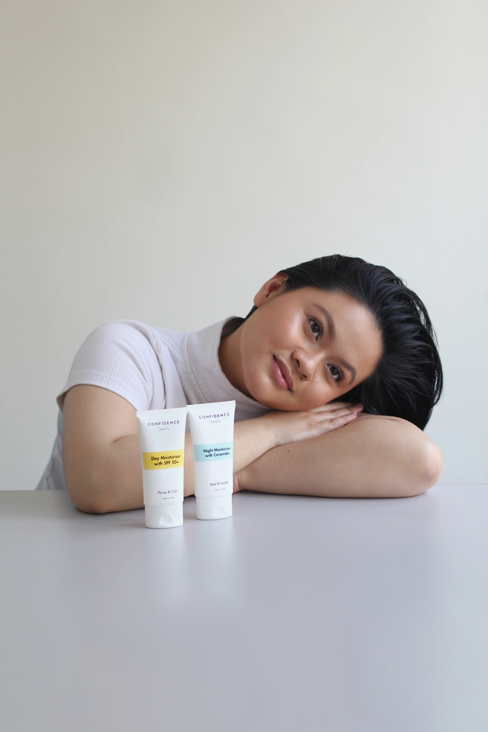 Sharifah Aryana with two of her products from Confidence Cosmetics. — Picture courtesy of Sharifah Aryana