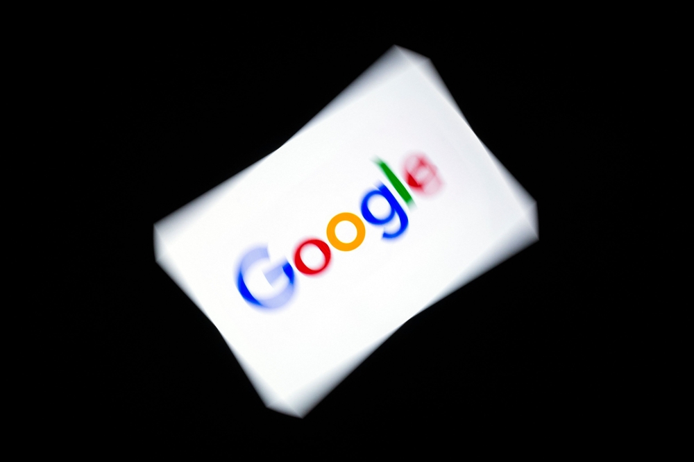 Google licenses its Android system to smartphone makers, but critics say it imposes restrictions such as mandatory pre-installation of its own apps that are anti-competitive. — AFP pic