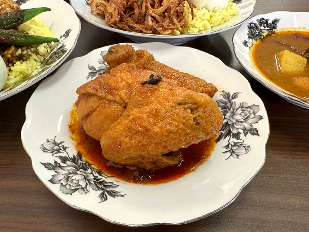 'Ayam merah' legend is milder tasting and less sweet with tender, juicy meat.