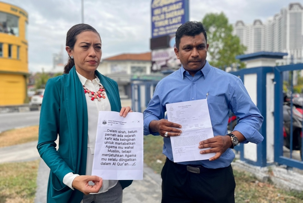 Syerleena Abdul Rashid (left) and Tanjong Parti Amanah Negara Youth chief Mohd Faruk bin Abdul Rahman after lodging the police report January 20, 2023. — Picture courtesy of Syerleena Abdul Rashid
