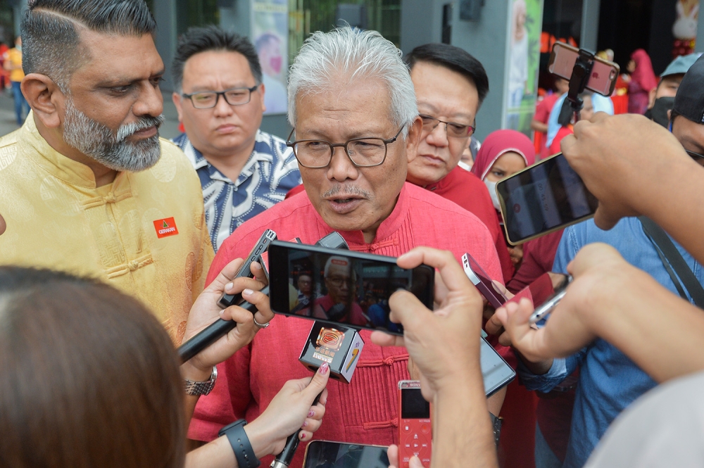 Perikatan Nasional secretary general Datuk Seri Hamzah Zainudin speaks to reporters after the party’s Chinese New Year open house celebration at Menara PGRM in Kuala Lumpur January 22, 2023. — Picture by Miera Zulyana