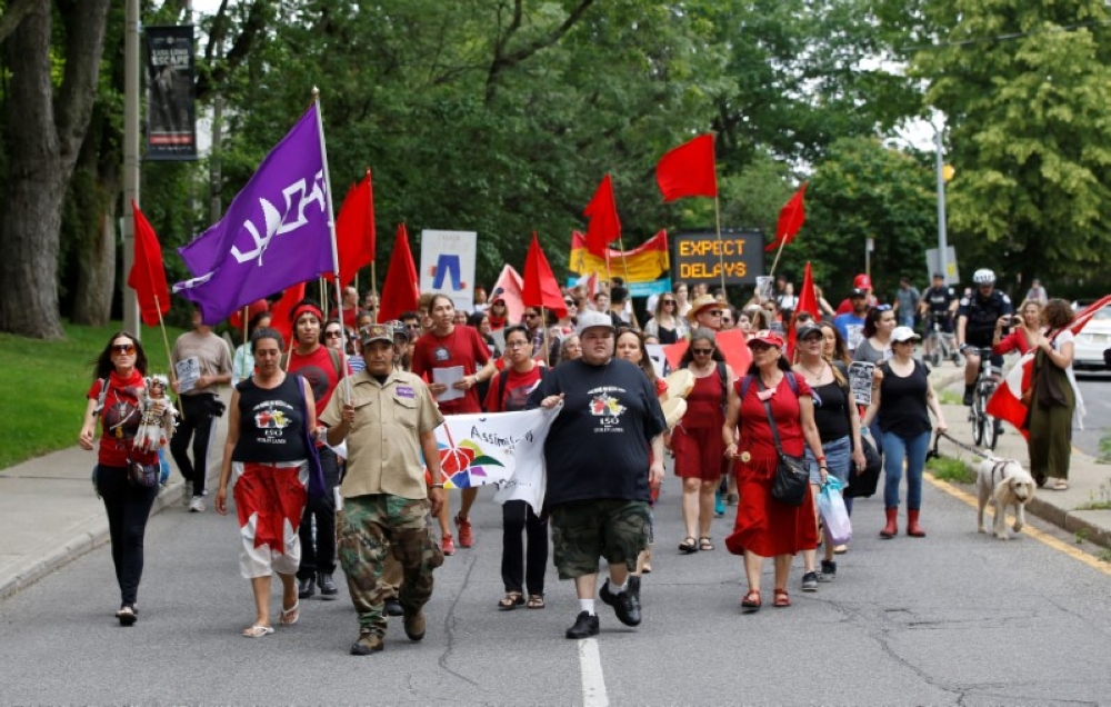 File photo of indigenous rights activists marching after in the 'Unsettle CanadaDay 150 Picnic', as the country marks its 150th anniversary with 'Canada 150' celebrations, in Toronto July 1, 2017. - Reuters pic