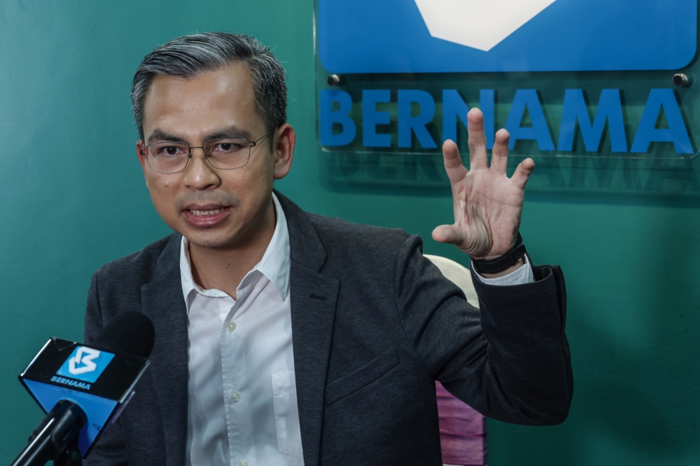 Communications and Digital Minister Fahmi Fadzil speaks during an interview with Bernama in Kuala Lumpur January 24, 2023. — Bernama pic